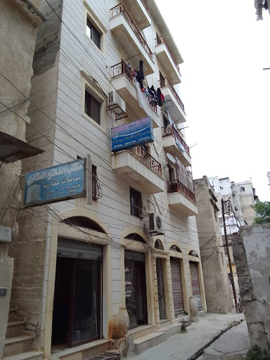 دكتور ماهر بوادري طبيب أسنان